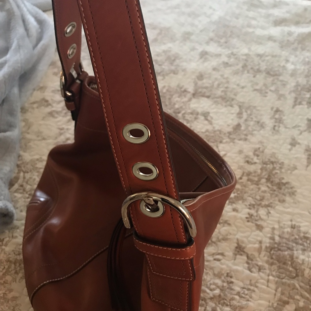 Brown leather Coach purse, brand new